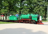 steam engine at a level crossing in dresden, great garden