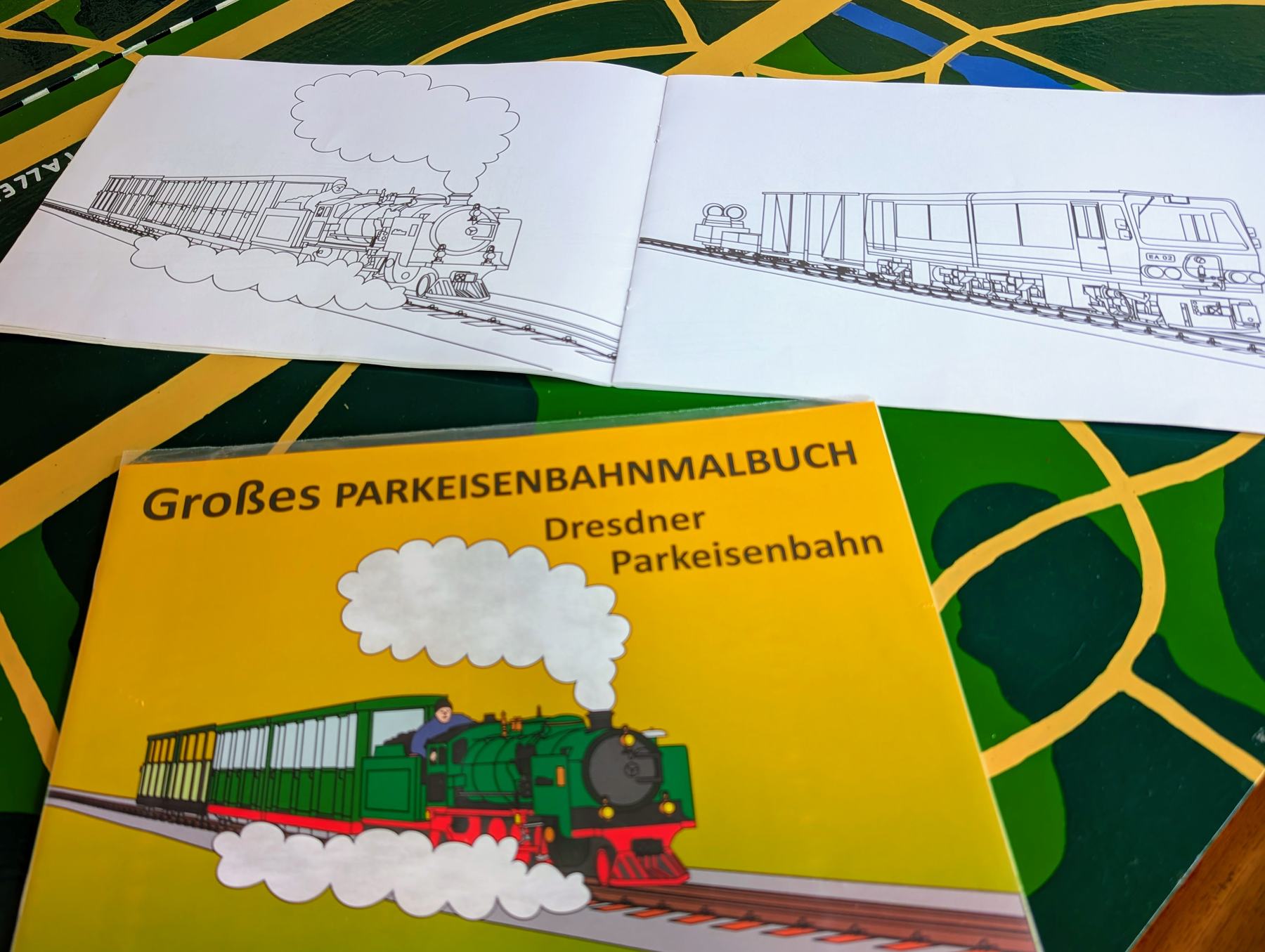 Deckblatt und Ausmalbilder des Malbuches der Parkeisenbahn
